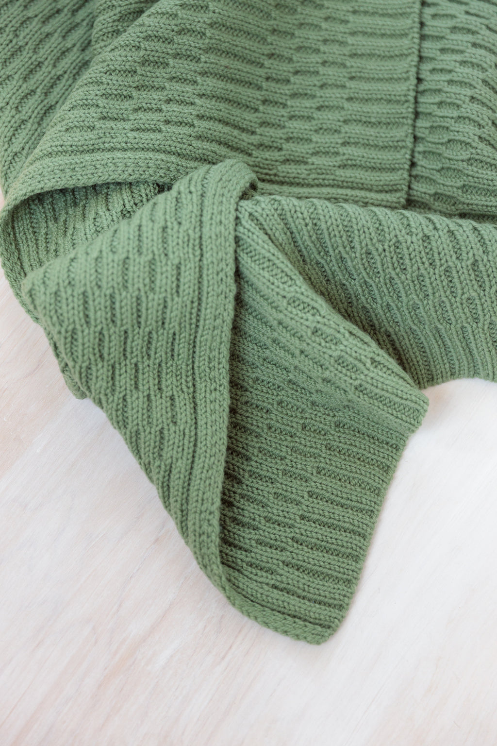 Sage green knitted discount blanket